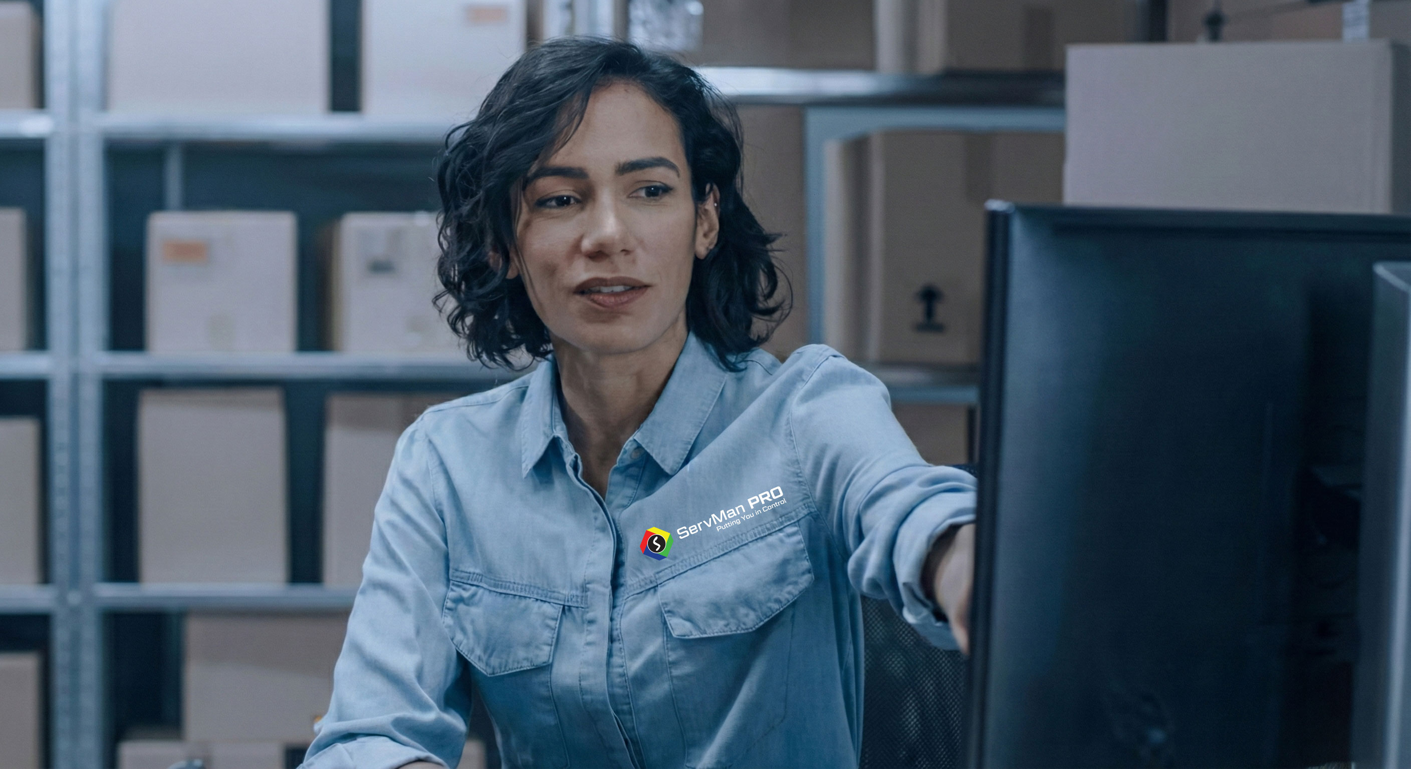 Woman pointing to computer screen